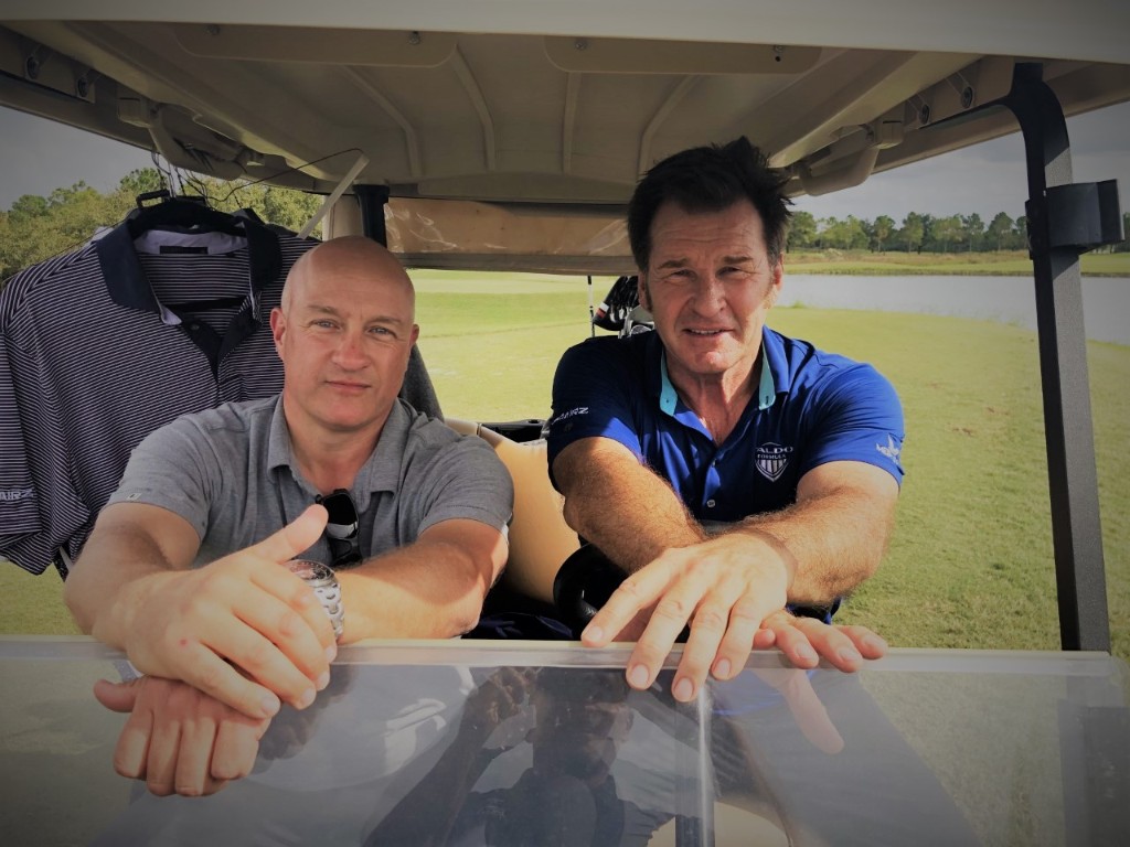 Nick Bradley with Sir Nick Faldo on the golf course
